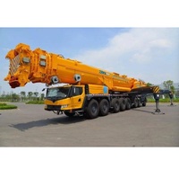 Grue tout-terrain XCA750 de 750 tonnes, hauteur de levage de 155 m, double moteur, 7 flèches, 7 essieux, stabilisateurs en H avec flèche Superlift