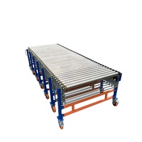 Convoyeur à rouleaux flexible robuste motorisé télescopique extensible pour usine de vêtements et de textiles