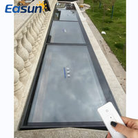 Système de lucarne en verre à lamelles verticales de forme personnalisée avec cadre en aluminium à rupture de pont thermique pour projets architecturaux