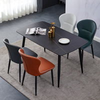 Chaise de salle à manger 2026 style sud-ouest en cuir, chaises de restaurant uniques avec pieds en métal noir