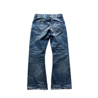 Fabricant de vêtements sur mesure – Jean en denim selvedge style japonais 15 oz avec bordure rouge, effet whisker naturel et coupe bootcut