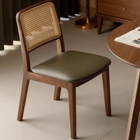 Chaise de salle à manger JP Mid Century en noyer avec dossier en rotin et assise rembourrée en cuir vert pour la maison