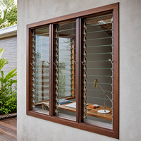 Fenêtre à jalousies en aluminium sur mesure avec lames de verre réglables pour le contrôle du flux d'air et la ventilation, idéale pour les projets de construction résidentielle