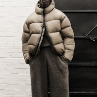 Manteau d'hiver en duvet pour hommes nouvelle mode manches amovibles épaissie imperméable coupe-vent couleur assortie veste à capuche bouffante