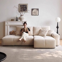 Canapé d'angle modulable en tissu, design moderne, assise large et confortable, dossier réglable, idéal pour villa, luxe et confort.