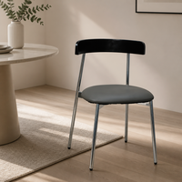 Chaise de salle à manger industrielle moderne en bois noir avec dossier rembourré, structure en métal chromé, emballage plat KD, vente en gros pour restaurants et parcs