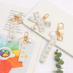 Porte-clés 3D en métal pour décoration de sac, pendentif créatif en forme de coeur pêche fraîche, accessoires avec nœud papillon - Product Image 3