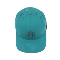 Casquette de golf unisexe bleu paon 5 panneaux, découpe laser, respirante, imperméable, en tissu chevron, logo en caoutchouc, design élégant, quatre motifs