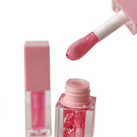 Huile pour les lèvres de marque privée avec pompon 48 saveurs au choix hydratant grand pinceau brillant à lèvres maquillage en gros huile dodue pour les lèvres
