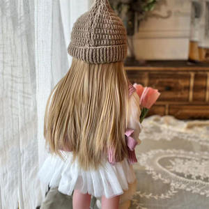 Poupée de simulation de naissance de 55 cm en silicone souple avec cheveux tressés, jouet compagnon pour enfants, vente en gros transfrontalière, succès TikTok - Product Image 4