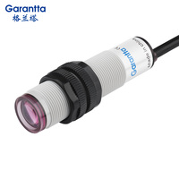 Capteur photoélectrique cylindrique traversant Garantta M18 NPN PNP pour détection de présence de bouteilles dans les machines de remplissage de liquides