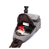 Tas dada kurir pria, tas selempang dada kanvas pria tahan air dengan Port pengisian USB grosir