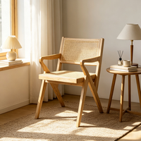 Fauteuil nordique en bois massif et rotin, dossier et assise en cannage tressé à la main, design à pieds croisés pour salle à manger, salon, hôtel et café
