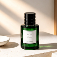 Flacon pulvérisateur de parfum vide en verre cylindrique de 30 ml et 50 ml avec logo personnalisé de qualité supérieure, pulvérisateur à brume fine, emballage cosmétique OEM ODM
