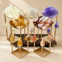 Vente en gros de nouveaux modèles d'œil d'Horus en cristal naturel sculpté, artisanat en cristal avec support métallique pour la décoration et les cadeaux