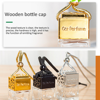 Diffuseur d'ambiance de voiture en verre mignon moderne pendentif de bouteille de parfum de luxe vide avec clip pour eau de Cologne à l'huile essentielle liquide