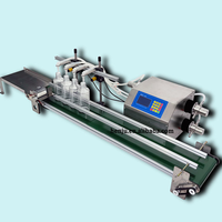 Machine de remplissage avec quatre buses pour gin, vodka, et équipement de remplissage de bouteilles en verre à petite échelle pour spiritueux/alcool, whisky