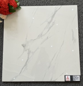 Carreaux de sol en marbre blanc Calacatta de Foshan, <span class=keywords><strong>prix</strong></span> bas au mètre carré, matériaux de construction, carrelage pour salon - Product Image 2