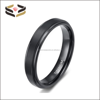 Bague de mariage en titane certifiée au design simple et tendance, sertissage invisible, plaqué or noir, pour homme et femme, idéale pour fiançailles, anniversaire, fête