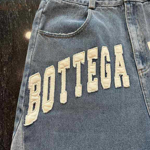 Pantaloncini con orlo grezzo con taglio dritto Athleisure da uomo lavorati a vita media in maglia Denim - Product Image 2