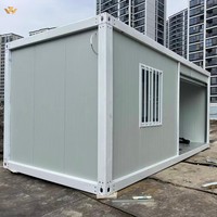 La maison mobile de type porte à volet roulant électrique de 20 pieds et 40 pieds peut être utilisée comme maison de conteneur modulaire dans une salle de stockage de garage