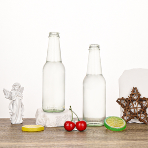 Ru Star 330ml Claro <span class=keywords><strong>Precio</strong></span> barato Botellas de cerveza de vidrio vacías personalizadas transparentes con tapas - Product Image 1