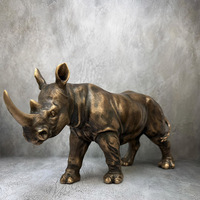 Sculpture de rhinocéros en bronze coulé à la main, statue réaliste en métal, moulage à la cire perdue, décoration d'art pour table, figurine de faune.