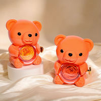 Boîte à bijoux en forme d'ours rotatif orange vibrant 360 °   Boîte de rangement pour bague et collier avec rose éternelle préservée, idéale pour un anniversaire