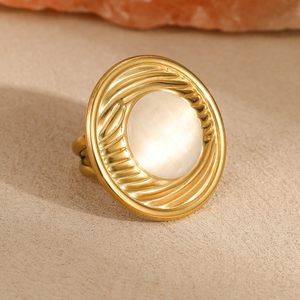 Ensemble minimaliste européen et américain de boucles d'oreilles et de bagues en titane avec pierres œil-de-chat, au design tendance et original. - Product Image 5