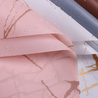 Papier d'emballage pour fleurs de haute qualité, motif marbre doré, imperméable, papier spécial pour l'emballage de bouquets, nouveaux fournitures de magasin