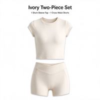 Ensemble de yoga 2 pièces personnalisé pour femme avec soutien-gorge intégré, haut court à manches courtes et short cycliste taille croisée en V pour l'entraînement