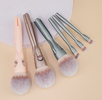 Nouvel ensemble de pinceaux de maquillage pour le visage 4-en-1, format voyage pratique, à fixation magnétique, en fibres synthétiques, avec manche en plastique, pour poudre libre
