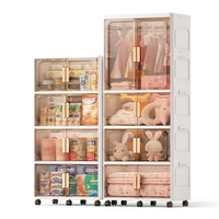 Armoire suspendue portable grise avec portes magnétiques doubles, organisateur de rangement pliable en plastique multi-niveaux pour vêtements d'enfants