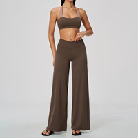 Nouvel ensemble de sport pour femme : haut court à col halter effet superposé et pantalon taille haute pour la course et le fitness