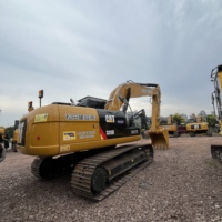 Excavatrice sur chenilles Caterpillar 320D d'occasion en bon état, pièces d'origine, pour projet de construction