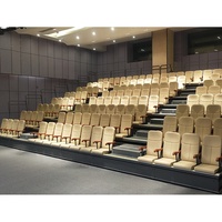 Tribune télescopique électrique avec sièges à accoudoirs rembourrés pour auditorium et salle de conférence