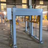 Système automatique de transfert et d'empilage de palettes pour les usines de blocs