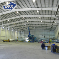Qingdao Hangar en acier industriel pré-fabriqué Conception de cadre de portail à portée claire Porte coulissante Application d'entrepôt Structure en acier
