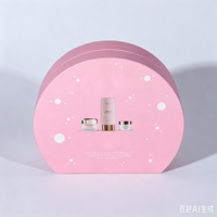 Boîte cadeau cosmétique rigide demi-ronde rose personnalisée avec impression étoile pour l'emballage d'un ensemble de soins de la peau