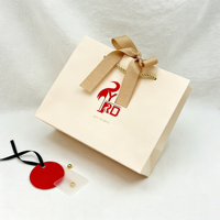 Sac de shopping en papier kraft beige crème recyclé de luxe avec votre propre logo, ruban et nœud pour emballage cadeau, impression personnalisée
