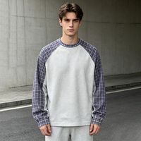 T-shirt Streetwear personnalisé en coton oversize à blocs de couleurs camouflage, T-shirt à manches longues gaufrées pour homme