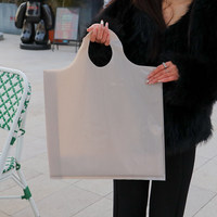 Sacs de courses en plastique épais à poignée perforée pour magasins de vêtements en gros, sacs d'emballage cadeau, personnalisables avec votre logo