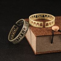 Bracelet bouddhiste zen en laiton, manchette ouverte, motif Bouddha de la Niche du Temple de la Caverne, motif Mille Bouddhas ajouré, effet vieilli vintage