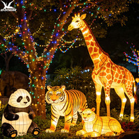 Maßgefertigte Lebensgroße Tier-Leuchtstatuen mit LED-Beleuchtung & Eisenrahmen & Seidenstoff für Zoo-Vergnügungspark-Dekoration