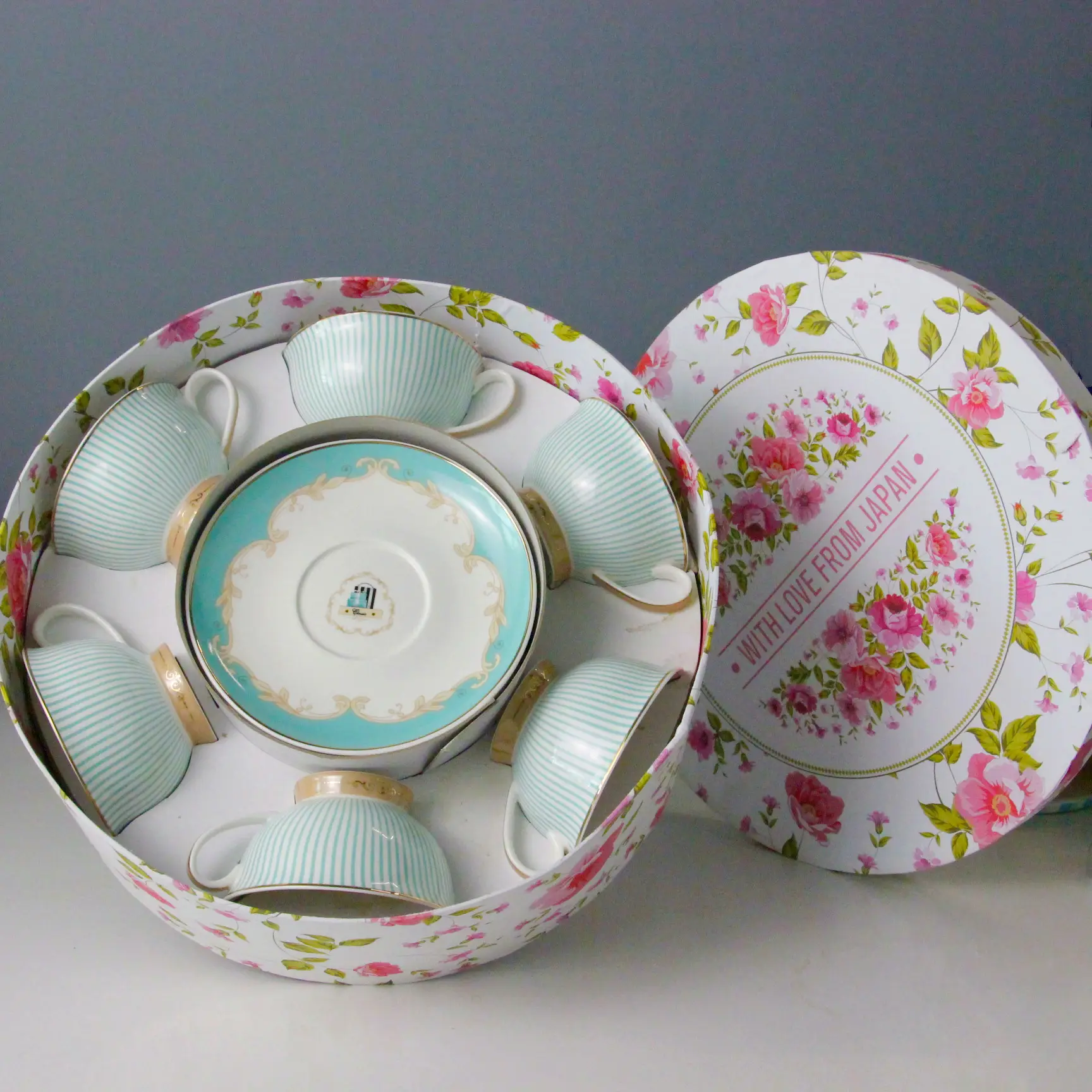 Ceramic Tea cup and saucer set of 6 Floral decal design With Gold rim Inside flower metal stand porcelain tea set For Gift