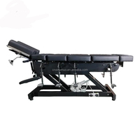 Table de chiropratique à manipulation électrique XinYiNuo modèle XYN-ECT04 avec fonction de chute manuelle et traction électrique de la colonne vertébrale en flexion