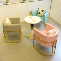 Fauteuil de salle à manger en métal de luxe léger Foshan pour ensemble de table de salon, idéal pour les salons de thé