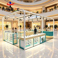 Meuble de magasin mobile moderne haut de gamme, vitrine murale pour étuis de téléphone et électronique pour la vente au détail de téléphonie mobile