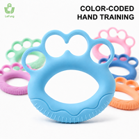 Anillo de Agarre de Mano de TPR de Cuatro Orificios, Resistencia Codificada por Colores de 10-60 lb, Entrenamiento de Dedos OEM ODM para Programas de Venta Minorista