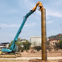 Suministro de fábrica Accesorios de maquinaria de construcción Excavadora Brazo de pluma de apilamiento Martillo de apilamiento de 10-30 metros para excavadora de 20-100 toneladas